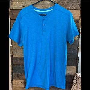 Blue three button men’s shirt. Very light and soft